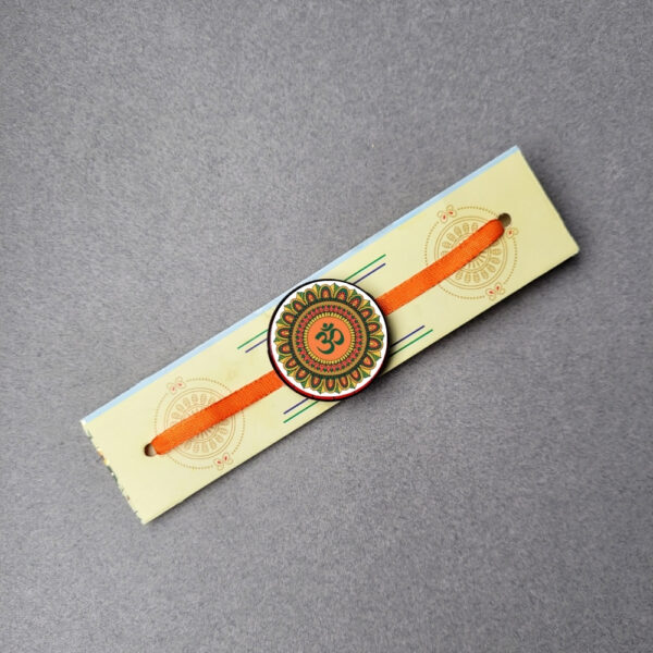 Om Printed Religious  Magnet Rakhi For Kids -  12 Pcs